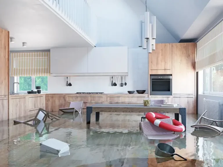 Flooded modern kitchen with floating furniture and a life preserver.